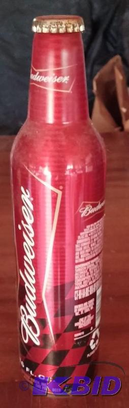 lot 17 image: NASCAR #8 Dale Earnhardt JR Metal Collectable Beer Bottle