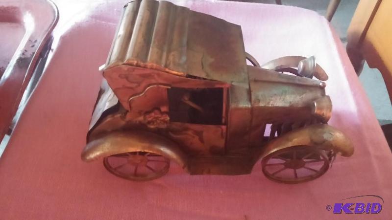 Brass antique car plays music