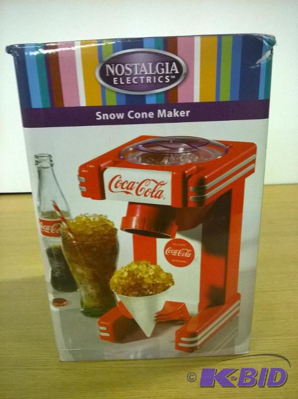 lot 45 image: Nostalgia Electrics RSM702COKE Snow Cone Maker
