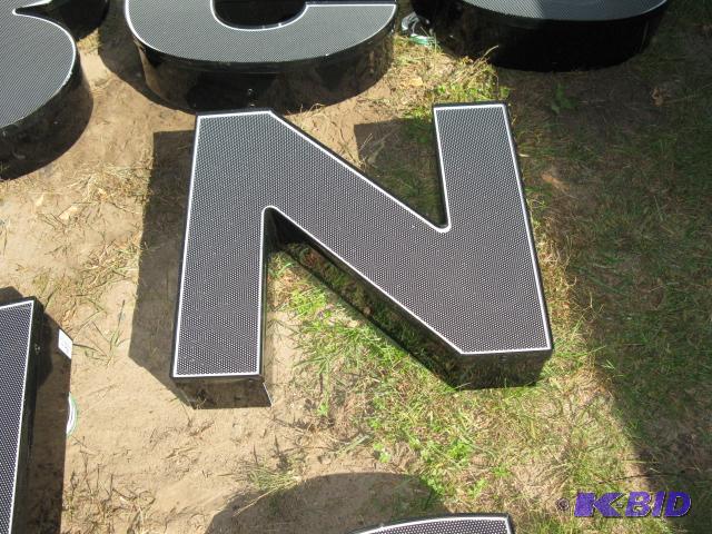 The letter N, lighted sign with wiring, appea...