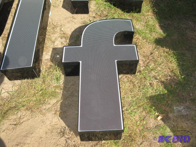 The letter f, lighted sign with wiring, appea...