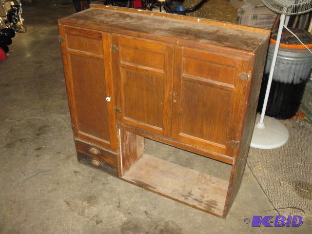 Old garage cabinet, has two drawers, and 2 ca...