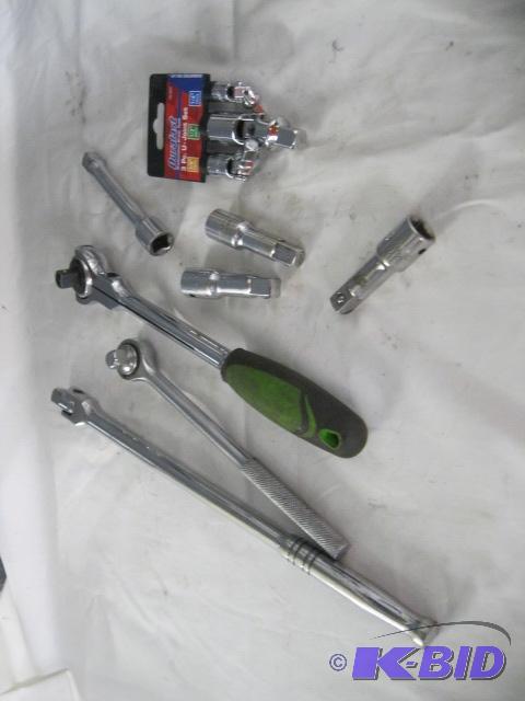 12 rachets, extension, breaker bar, new duralast 3 pc u joint set