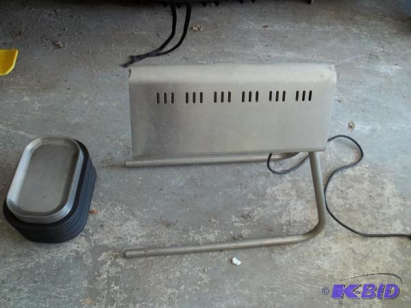 Heat lamp works, comes with 15 steak plates...