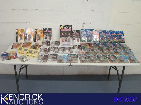 lot 27 image: Large Lot of New in the Box Starting Lineup, Bobblehead, and G.I. Joe Toys