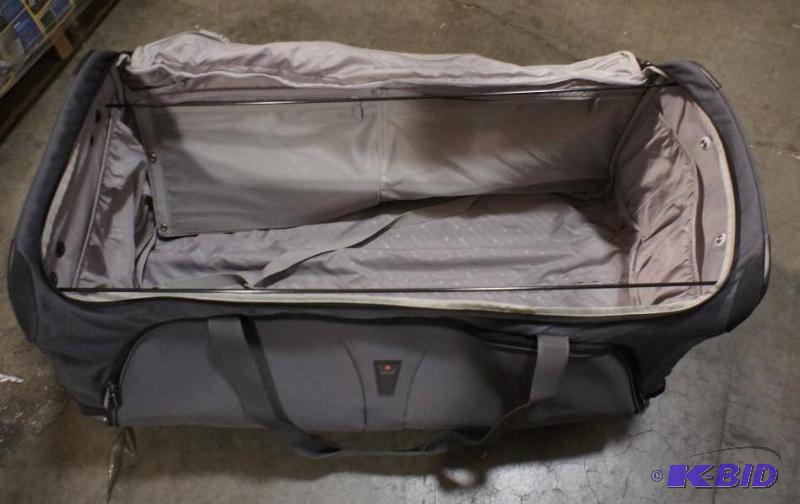 lot 18 image: New Delsey Travel Luggage Duffle Bag. MSRP $2...