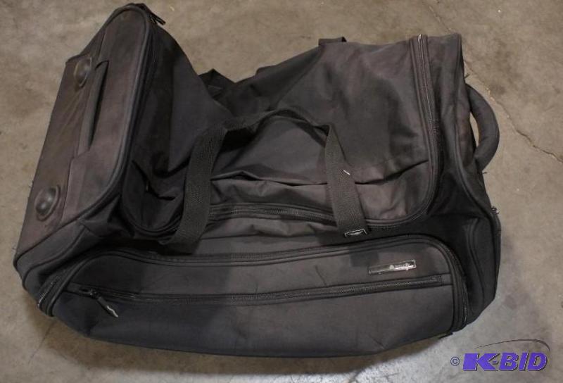 lot 19 image: New Delsey Travel Luggage Duffle Bag. MSRP $1...