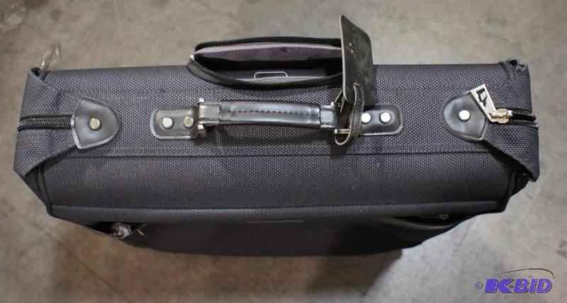 lot 21 image: New London Fog Travel Garment Bag. MSRP $199....