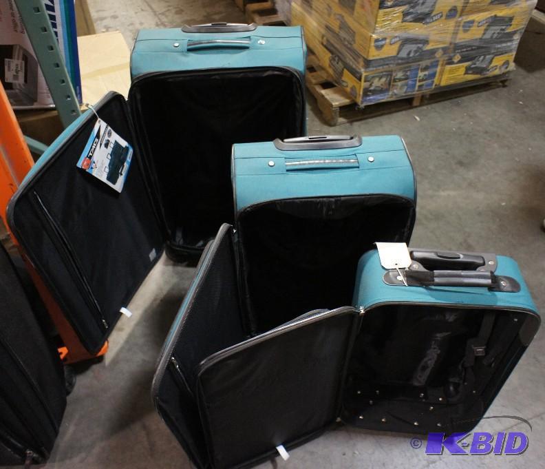 lot 5 image: New Tag 3pc Luggage Set. MSRP $399. Largest b...
