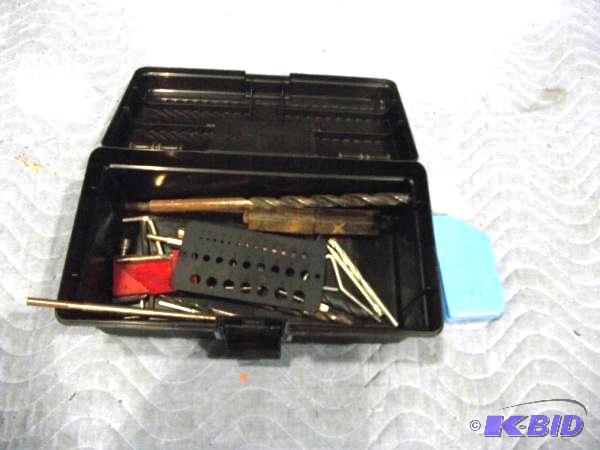 Small plastic tool box with assortment of dif...