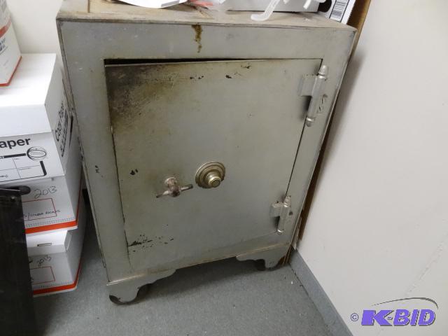 Vintage safe. Includes combo, but it is locke...