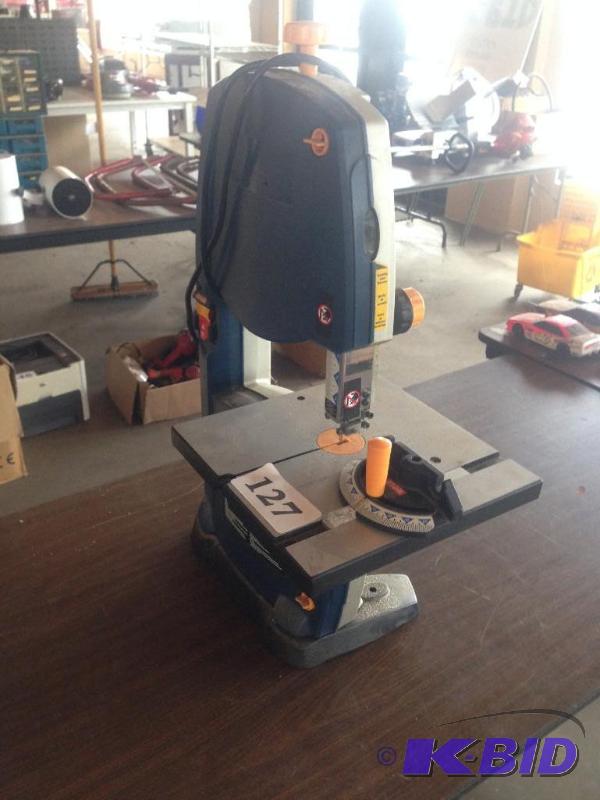 lot 127 image: Ryobi 9 inch bench top band saw....