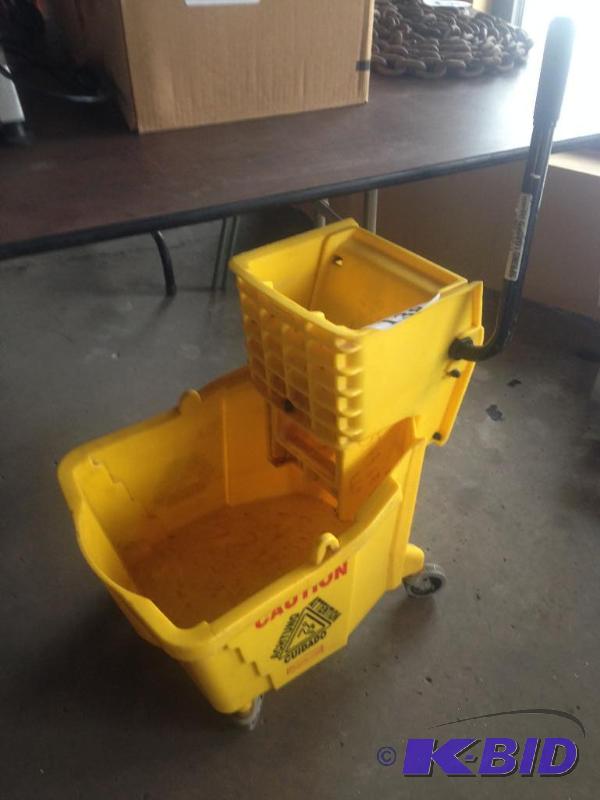 lot 138 image: Mop bucket with wringer....