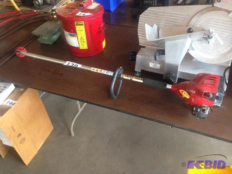 lot 139 image: Homelite gas powered weed whacker  trimmer. ...