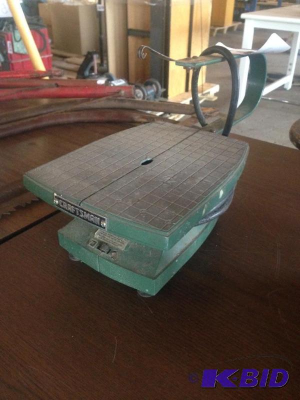 lot 142 image: Old vintage Craftsman table jig saw....