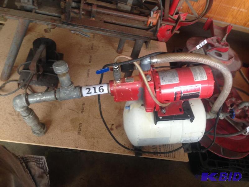 lot 216 image: Shallow well jet pump and tank....