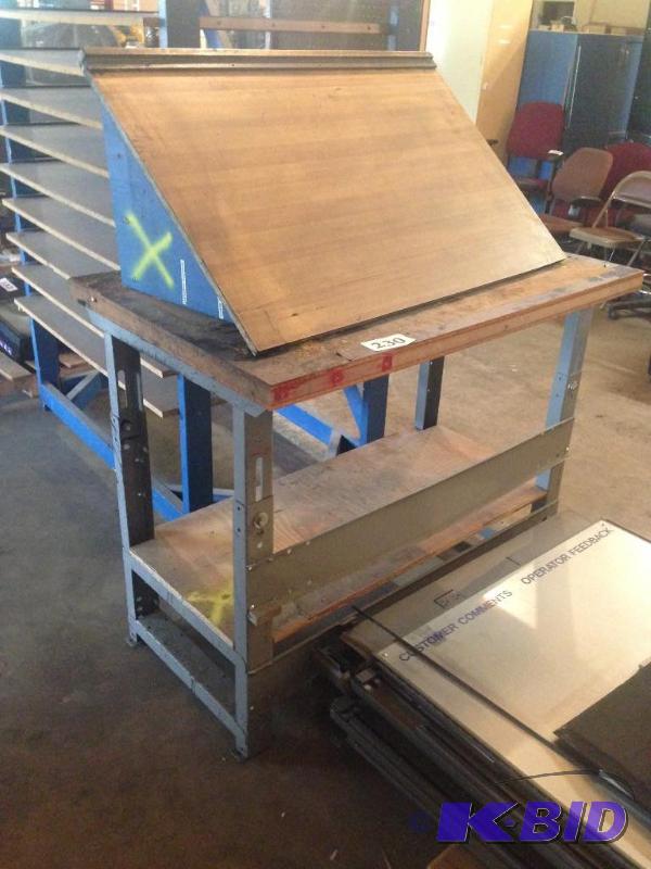 lot 230 image: Work bench and angled top desk unit....