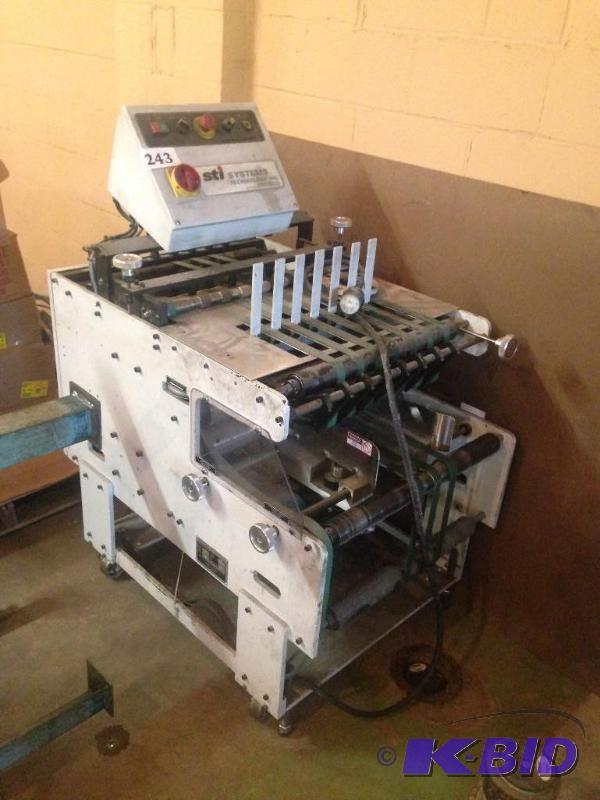 lot 243 image: STI direct mail machine....