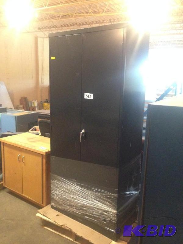 lot 245 image: 2 door upright metal cabinet....
