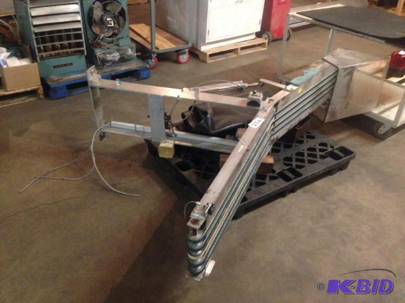 lot 254 image: Angled powered conveyor section....