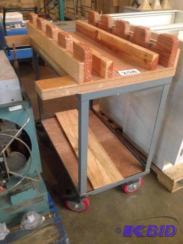 lot 258 image: Metal cart in casters (wood contents included...