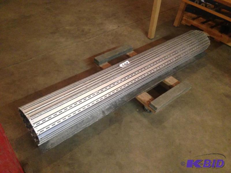 lot 261 image: Commercial aluminum backed rolling door mat....
