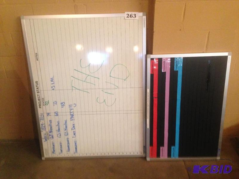lot 263 image: Ruled white dry erase board and pocket board....