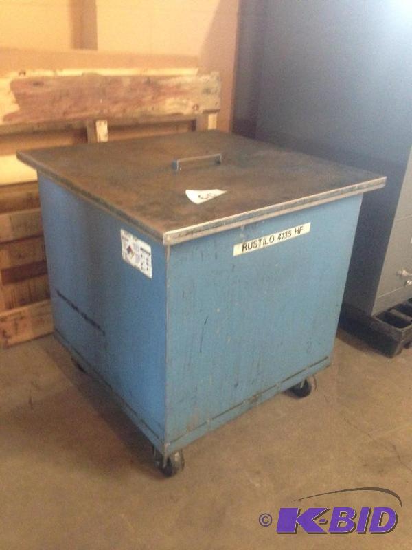 lot 65 image: Fluid tank on casters....