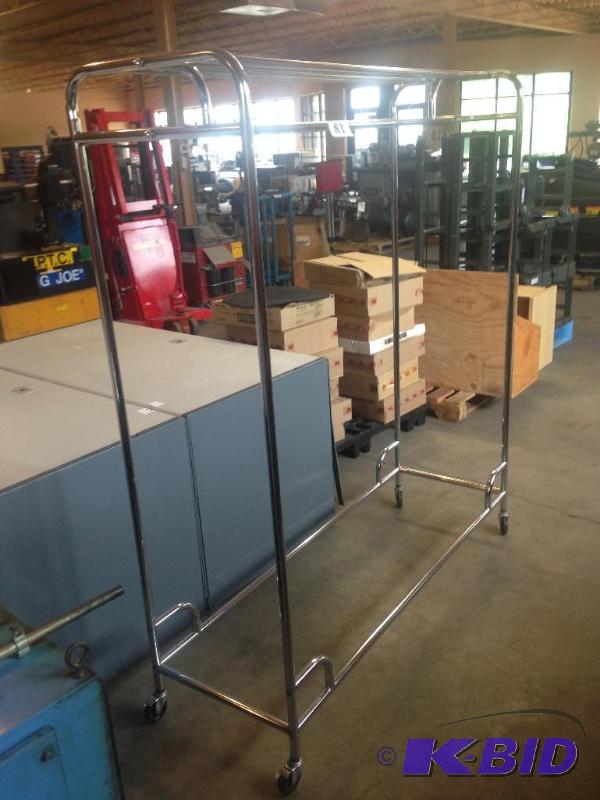 lot 83 image: Clothing stock rack....