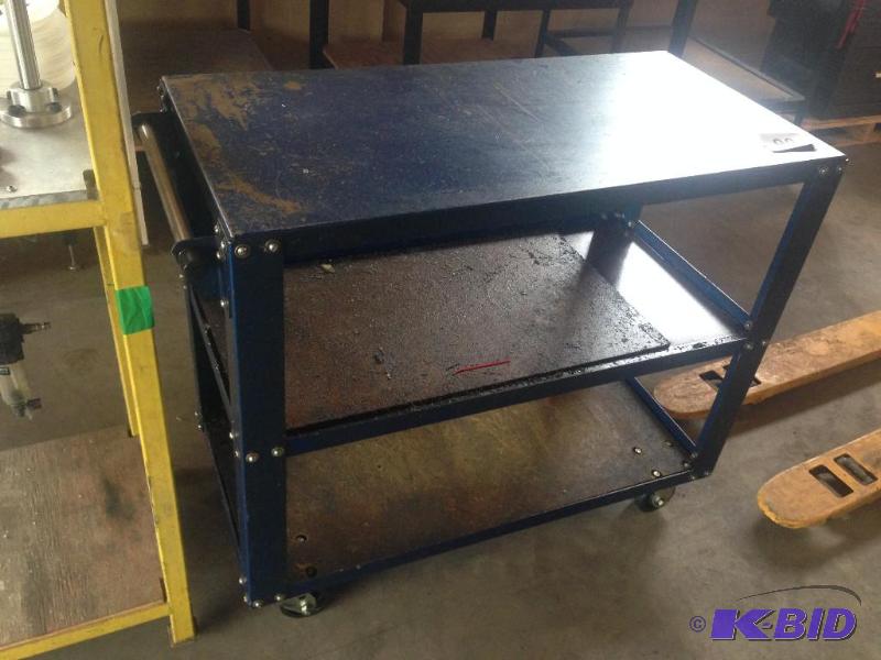 lot 99 image: Metal shop cart on casters....