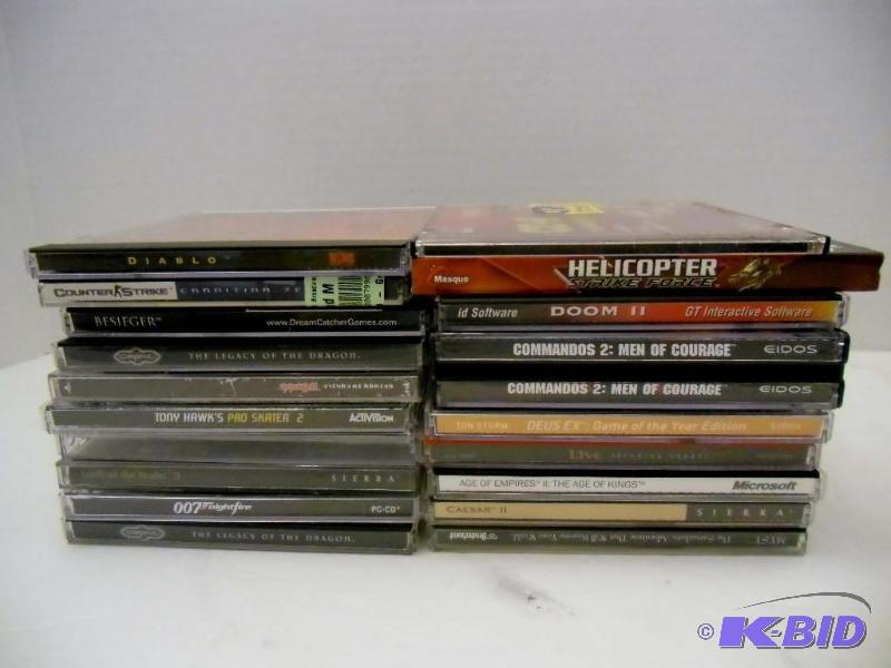 lot 20028 image: 19 PC Computer Games Doom II Tony Hawk Skate Board Myst Commandos