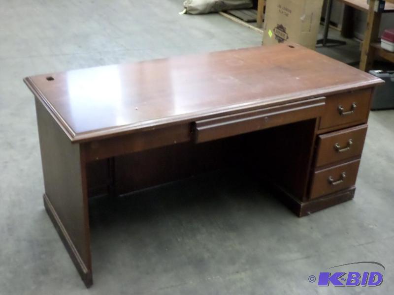 lot 23 image: Vintage Solid Wood 4-Drawer Desk...