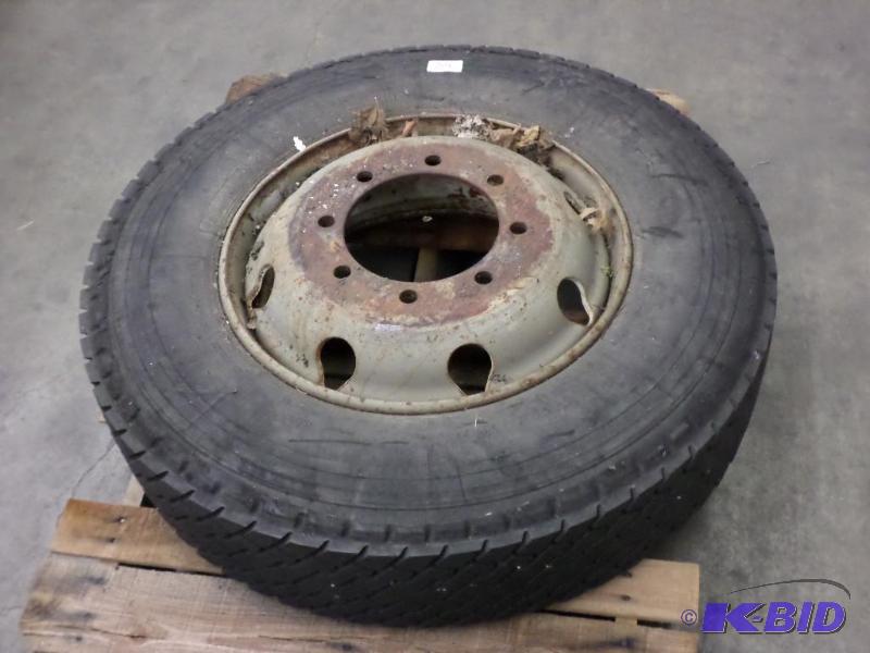 lot 54 image: (1) 8-Lug Steel Rim With 10R22.5 Tire, 8x10 1...
