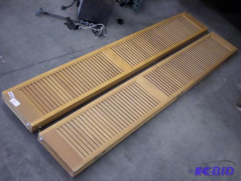 lot 90 image: (2) Bi-Fold Wood Closet Doors...