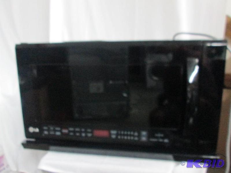 2.0 CU. FT. OVER THE RANGE MICROWAVE OVEN WITH EXTENDA VENT AND WARMING LAMP