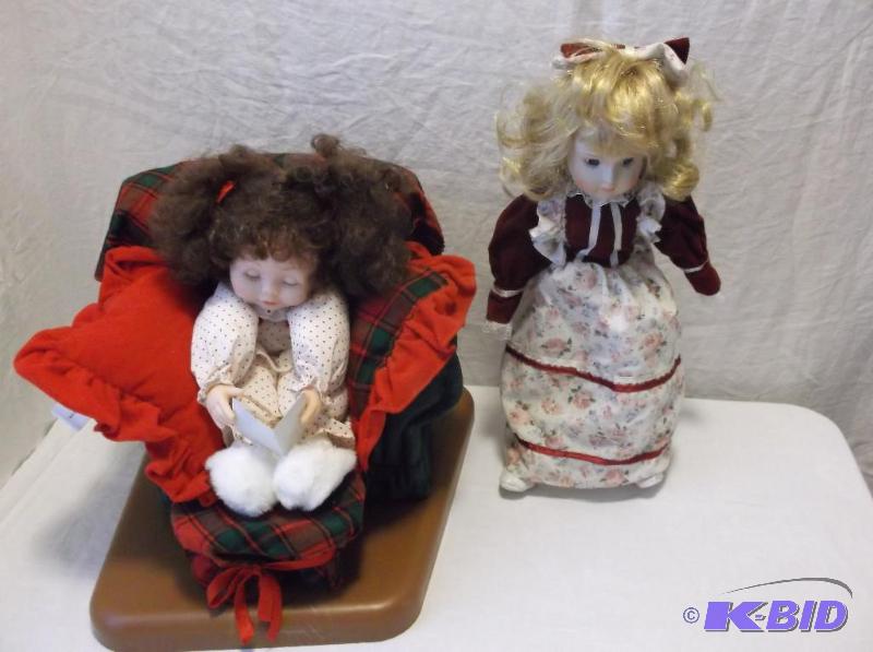 Beautiful porcelain dolls one sleeping in cha...