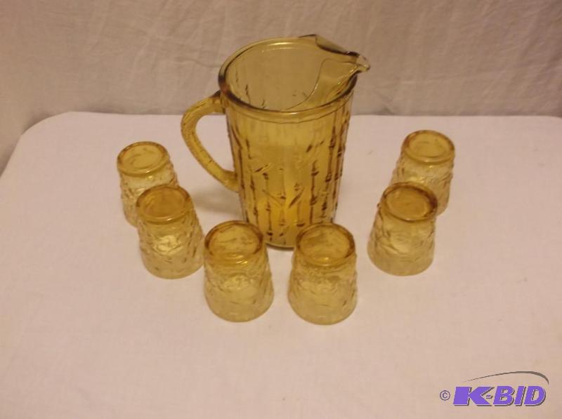 Amber pitcher &amp glass set appears in grea...