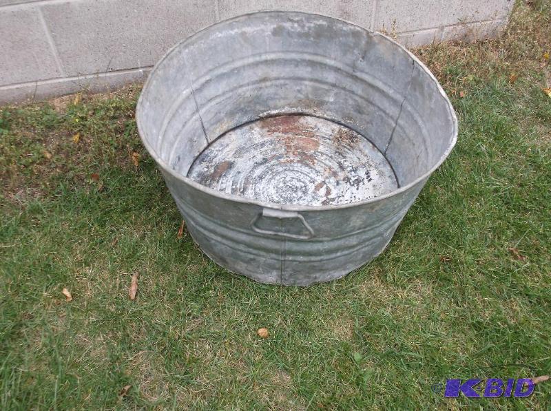 Galvanized wash tub has a little rust couple ...