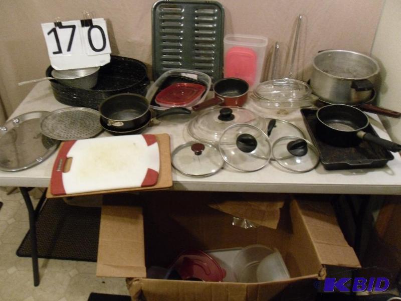 Lot of Kitchen Items. Pots, Pans, Lids, Paper...