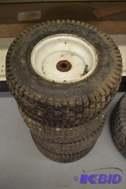 lot 103 image: Four - 12x5.00-6 Tires and Rims