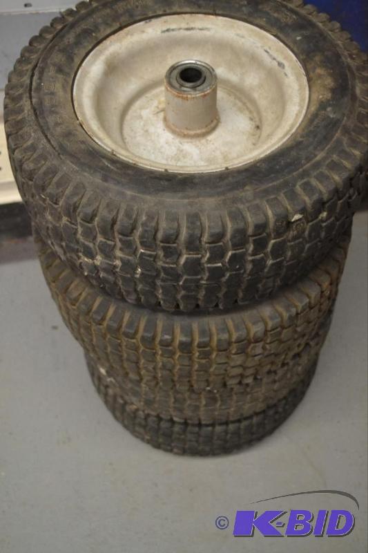lot 105 image: Four - 12x5.00-6 Tires and Rims