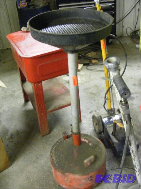 lot 44 image: Under the hoist oil drain pan, without wheels...