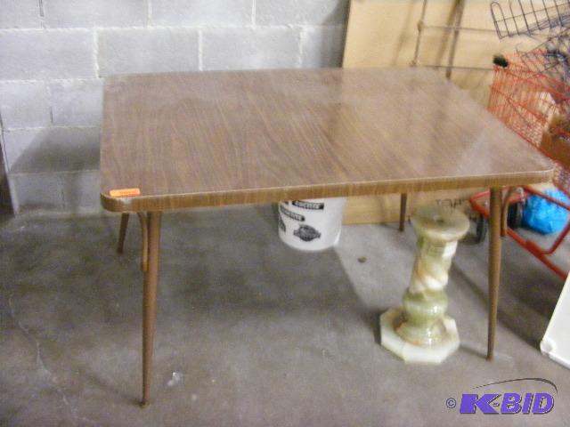 Older Table with metal legs, 35 wide x 49...