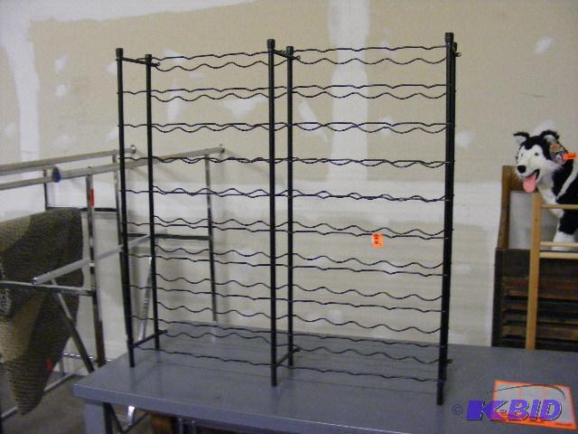 Bottle Rack or Wine Rack. Hangs on wall. Meta...