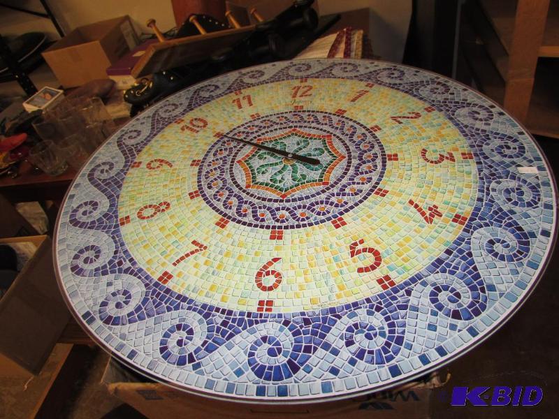 Glass Clock, with mosaic design. There is a c...