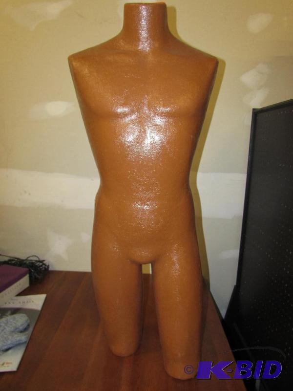 34 Maniquin, neck to knees. Made out of plas...