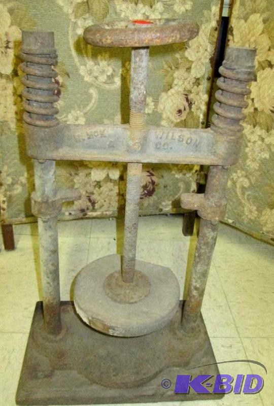 lot 126 image: N McK Wilson & Co iron press, stands 21 i...