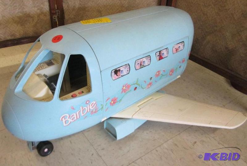 lot 22 image: Vintage Barbie airplane 23 inches long...