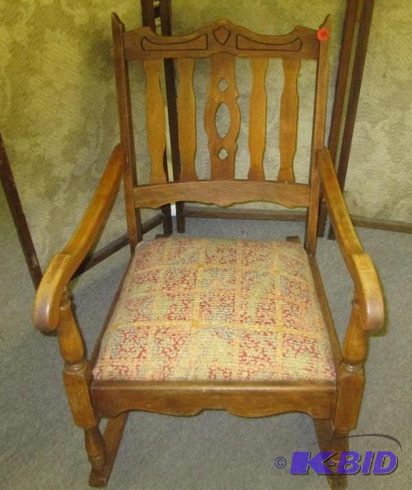 lot 45 image: Antique rocking chair with plush seat...