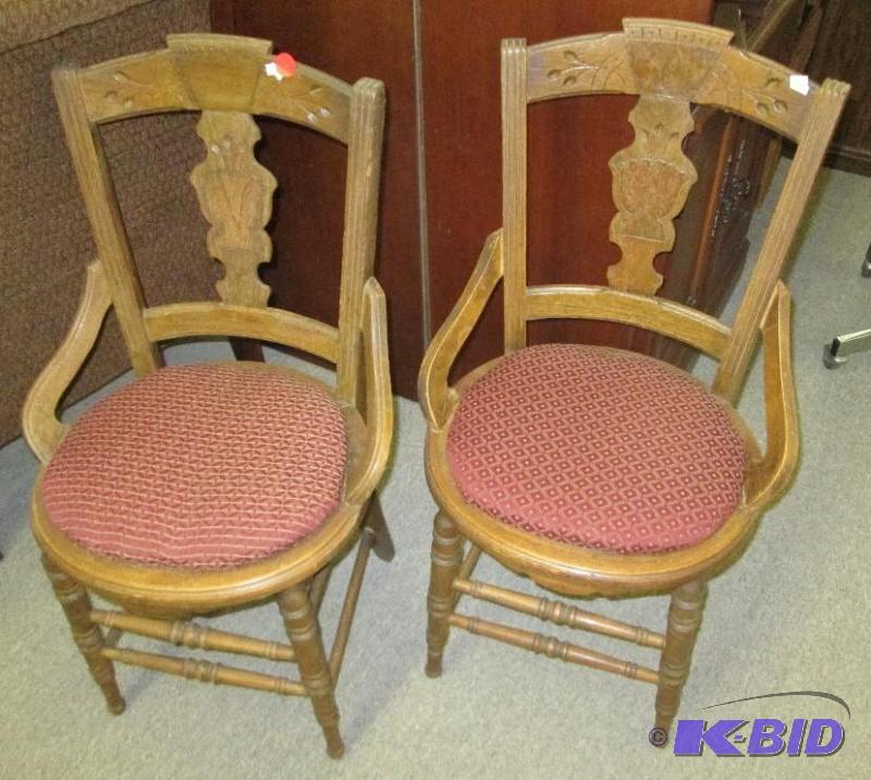 lot 70 image: Pair of wood chairs with burgundy seats...